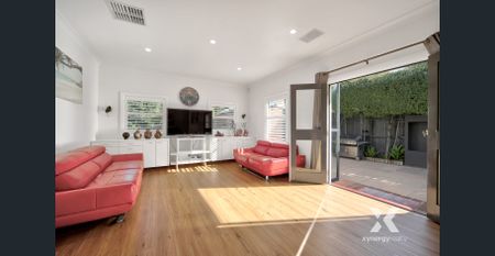 Spacious 3-Bedroom Home with Modern Amenities in Prime Location - Photo 2