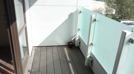 North facing apartment with a balcony and two garage parking spaces. - Photo 4