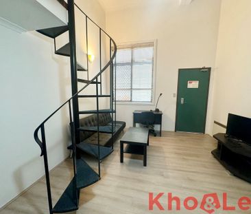 RENOVATED FURNISHED LOFT IN PRIME LOCATION! - Photo 1