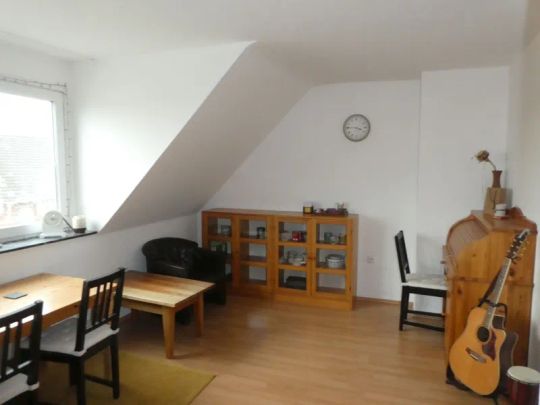 Hübsche 2-Zimmer-Dachgeschoss-Wohnung im Herzen von Asberg - Photo 1