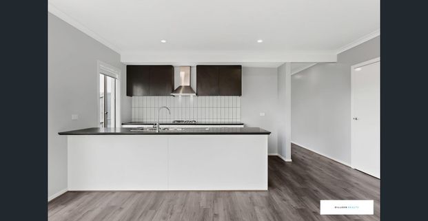 4-Bedroom Living with Modern Comforts! - Photo 1