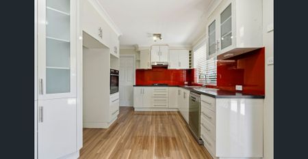 Freshly Updated Family Home with Extra Living Space in Prime Location - Photo 2