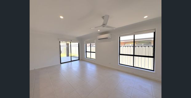 Modern Family Home in Lochinvar - Photo 1