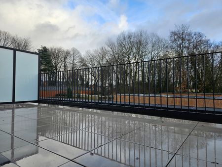 Recent appartement met 2 slaapkamers, terras en carport - Photo 2