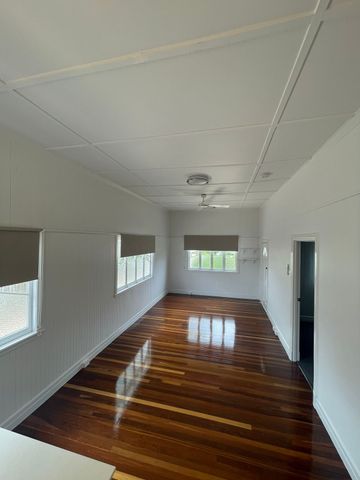 Welcome to 2/42 Macrossan Street - a neat and comfortable townhouse in the heart of South Townsville. - Photo 3