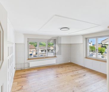 GENEROUS AND NEWLY RENOVATED - Photo 1