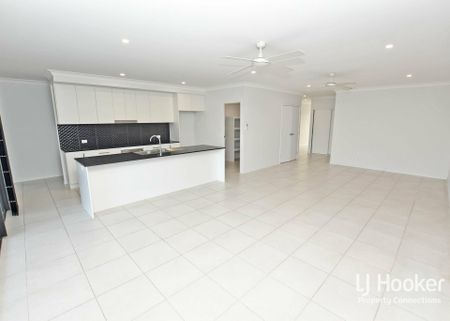 MODERN FAMILY HOME WITH MULTIPLE LIVING AREAS! - Photo 3