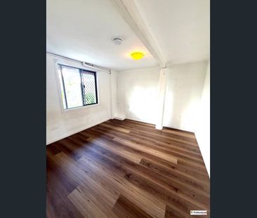 High set Home in the heart of Logan Central - Photo 4