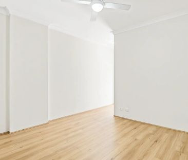 Modern & Fresh: Renovated 2-Bed Unit with Brand New Floating Floors - Photo 3