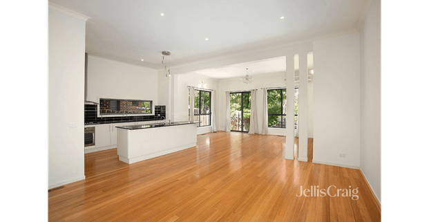 Spacious Modern Home with Courtyard & Double Garage - Photo 1