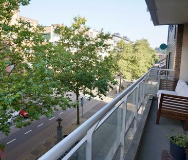 Centraal gelegen appartement met 2 slaapkamers en autostaanplaats. - Photo 4