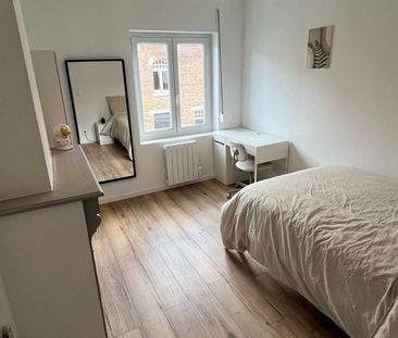Appartement à louer - Photo 2