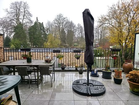 Prachtig appartement met 2 slaapkamers, ruim terras en garagebox in het hart van ’s-Gravenwezel - Photo 4