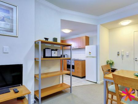 FURNISHED APARTMENT LOCATED IN THE CBD - Photo 3