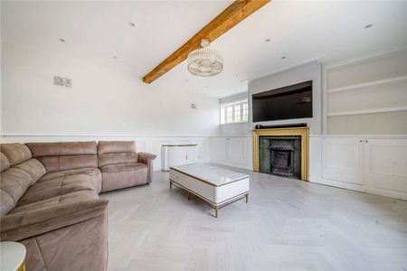 A stylish family home blending timeless character and modern living. - Photo 2