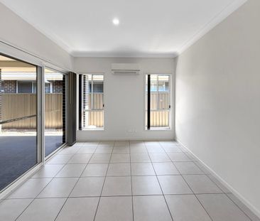 Charming 4-Bedroom Home in Prime Gregory Hills Location - Photo 2