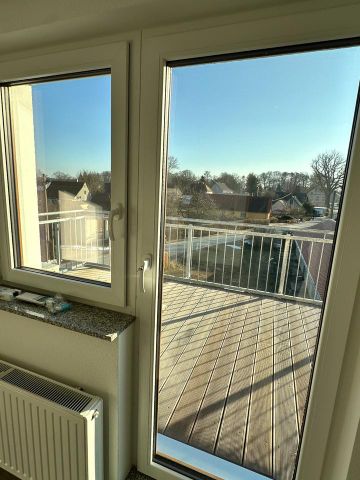 Erstbezug! Hochwertig sanierte Dachgeschoss-Wohnung mit Wintergarten und Balkon - Foto 4