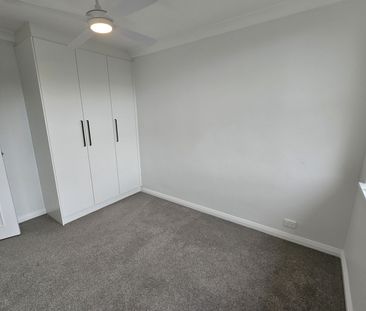 IMPECCABLY RENOVATED APARTMENT OFFERING COMFORT, STYLE AND CONVENIENCE - Photo 5