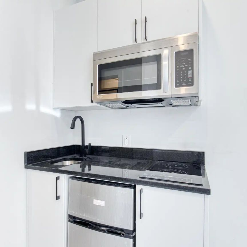 591 Ash and 2024 Wellington — 2-1/2 - Photo 1