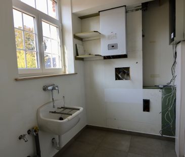 Bel-etagewoning met 3 slaapkamers, balkon, tuintje en garage. - Foto 4