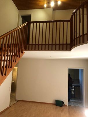 4.5-room maisonette apartment with private suite Located in the center of Birsfelden, near Birsköpfli & Hardwald Local recreation area included - Photo 1