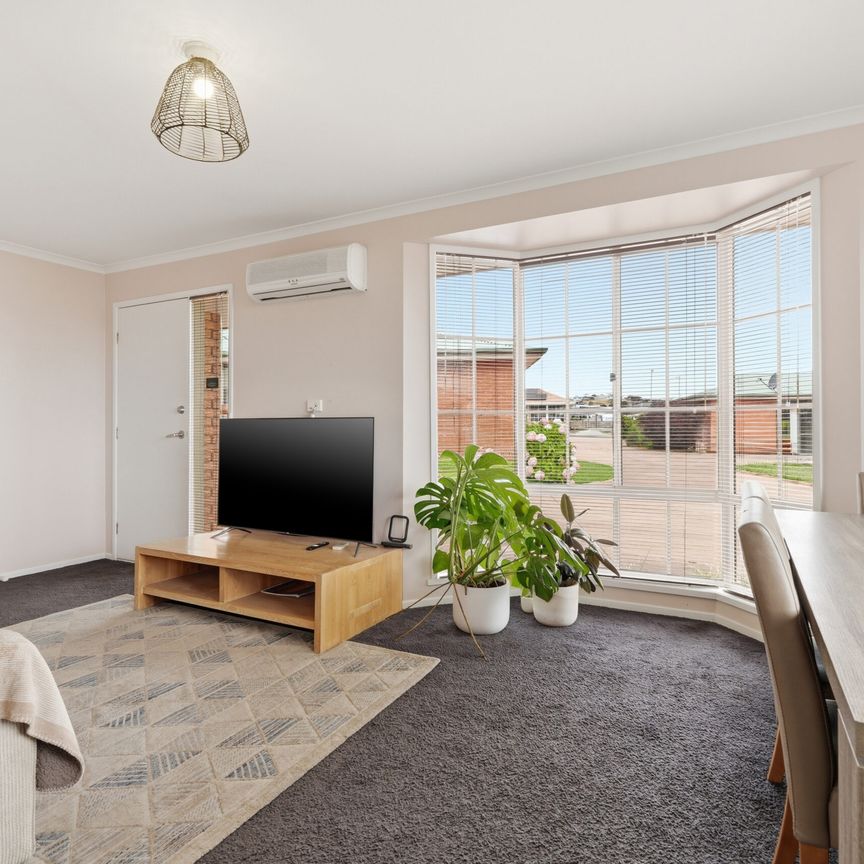 Private, Low-Maintenance Living in Sought-After Oakdowns - Photo 1