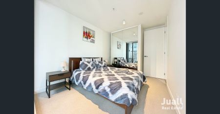 Stylish Fully Furnished 1-Bedroom with Balcony and Modern Amenities - Photo 5