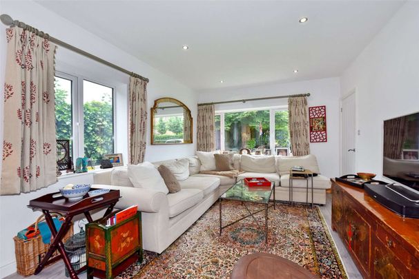 A beautifully updated four bedroom detached home, located on the Abbotsbrook Estate. - Photo 1