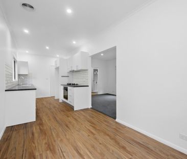Renovated 3 Bedroom Townhouse in Great Location - Photo 1