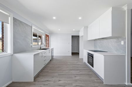 RENOVATED HOME WITH AN INGROUND SWIMMING POOL! - Photo 2