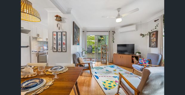 OVERSIZED UNIT WITH LEAFY OUTLOOK IN THE HEART OF BARDON! - Photo 1