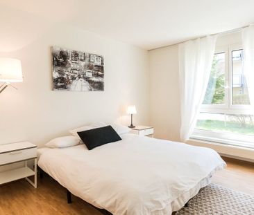 Moderne 5.5-Attikawohnung an zentraler Lage - Photo 4