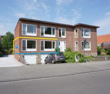 Gelijkvloers 2-kamerappartement met mogelijkheid autostaanplaats - Foto 1