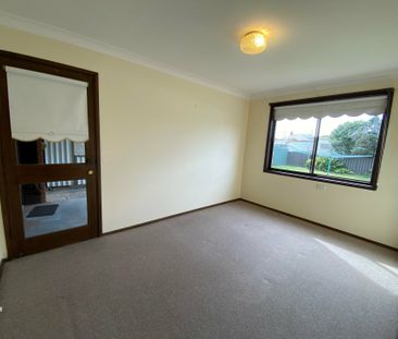 Charming Three-Bedroom Home in a Fantastic Location! - Photo 1