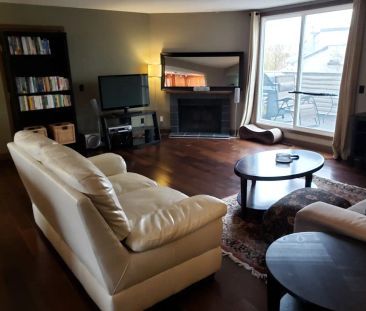 Across from Foothills Hospital - Fully Furnished 2 Bedroom 2 Bath+Den Condo — 2 Bedrooms+ Den Condo Unit - Photo 1