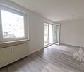 Hochparterre - Wohnung mit 2 Zimmern, offener Küche und Balkon in N... - Foto 1
