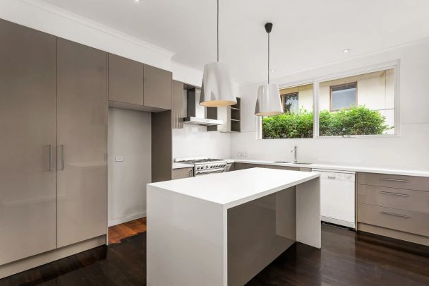 Spacious Four-Bedroom Family Home Moments from Landcox Park - Photo 1