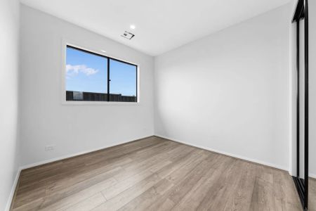 BRAND NEW LIGHT FILLED FAMILY HOME IN BEVERIDGE - Photo 4