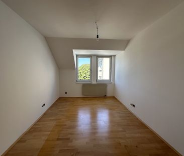 Großartige Dachgeschoßwohnung im Stadtzentrum mit Terrasse! - Photo 3