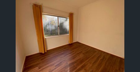 Neat 2-Bedroom Home in a Quiet Location - Photo 4