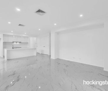 BRAND NEW LIGHT FILLED FAMILY HOME IN BEVERIDGE - Photo 1