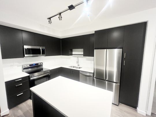 Spacious and Bright! Brand New Two Bedroom and Den in Convenient Fleetwood - Photo 1