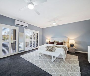LIGHT-FILLED FAMILY RETREAT OFFERING SPACE AND CONVENIENCE - Photo 5
