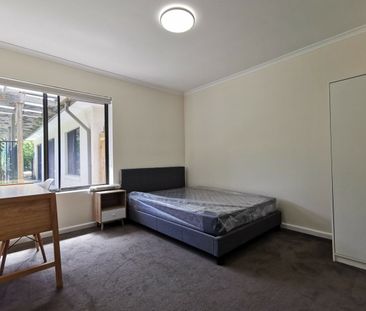 **Spacious Furnished Room in a Well-Maintained Shared Home** - Photo 1