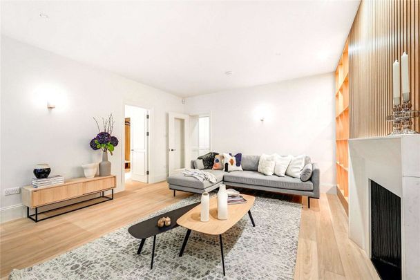 An interior designed newly renovated two bedroom apartment in this well maintained red brick building. - Photo 1