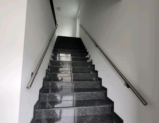 Moderne Neubauwohnung mit Balkon in zentraler Lage von Herford - Foto 1