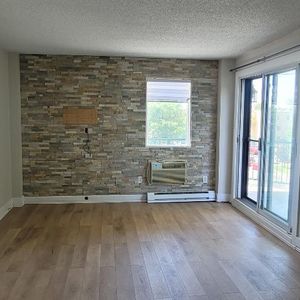GRAND CONDO 4 1/2 LUMINEUX À LOUER - ANJOU - Photo 2