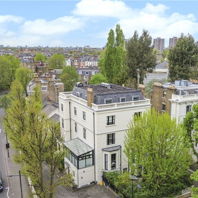 A fabulous, well presented and naturally bright three bedroom lateral apartment set on the third floor of this detached period villa on one of the most sought-after roads in Holland Park. EPC rating: C - Photo 1