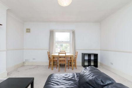 Attractive period conversion property with charm and character located on a popular, tree-lined street. - Photo 3