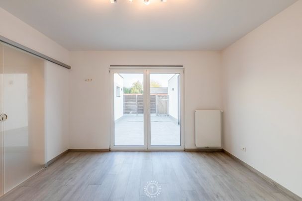 Ruim en energiezuinig gelijkvloers appartement op wandelafstand van de Schelde - Photo 1